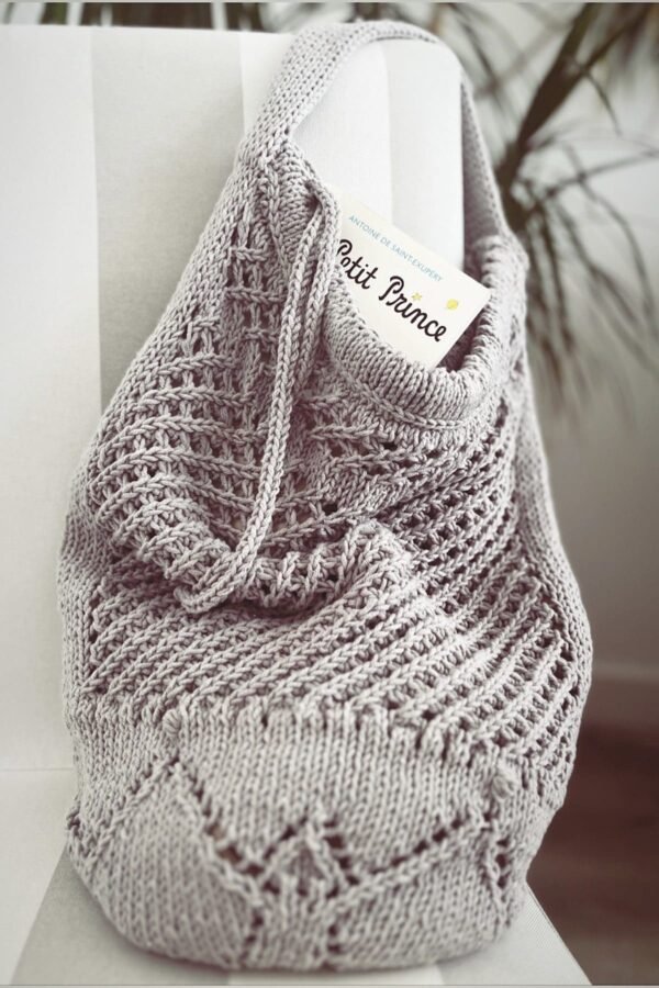 Gray knitted baby blanket with drawstring and Prince tag. Newborn essentials, baby shower gift.